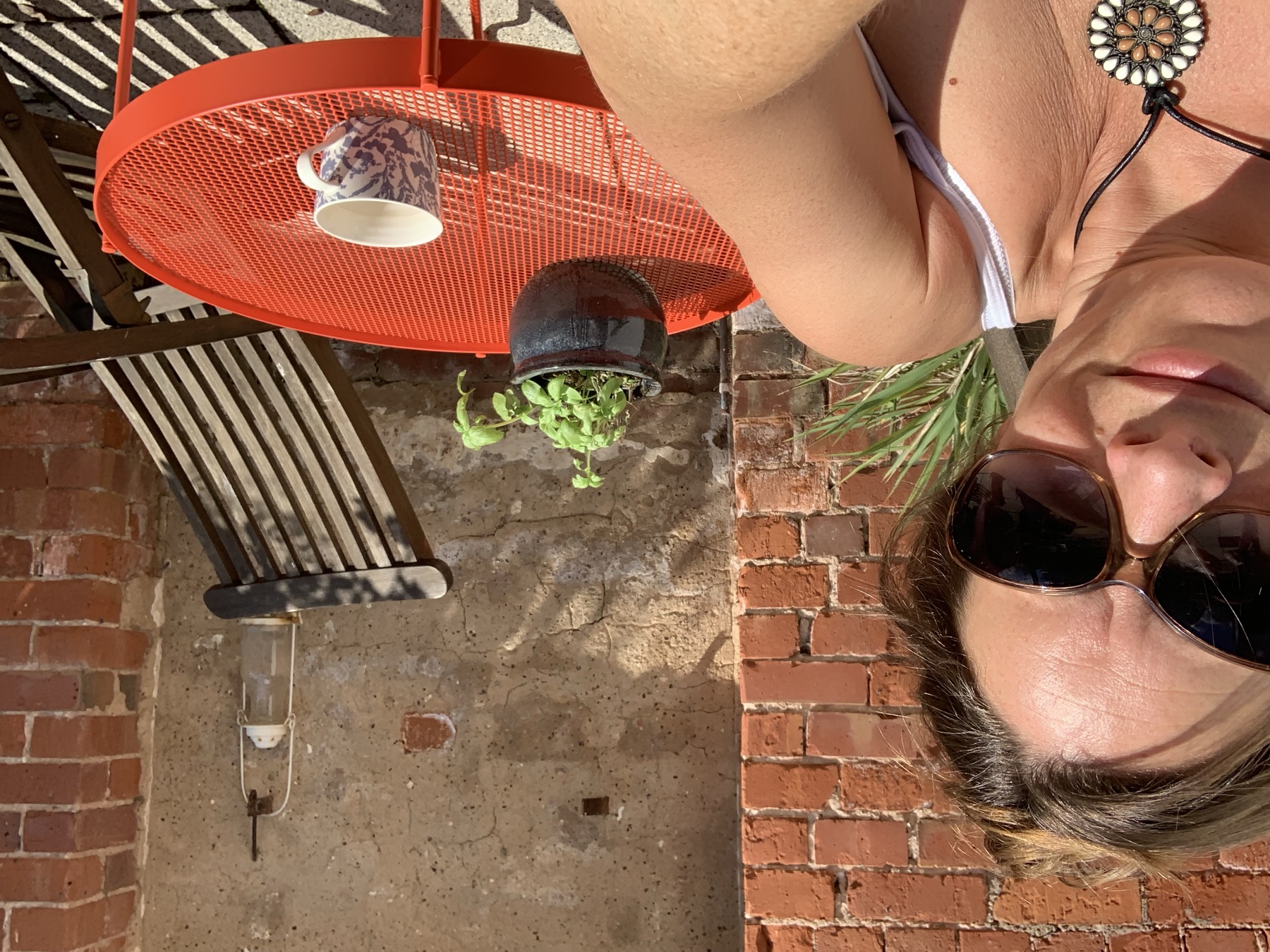 Kate in the sun on the patio