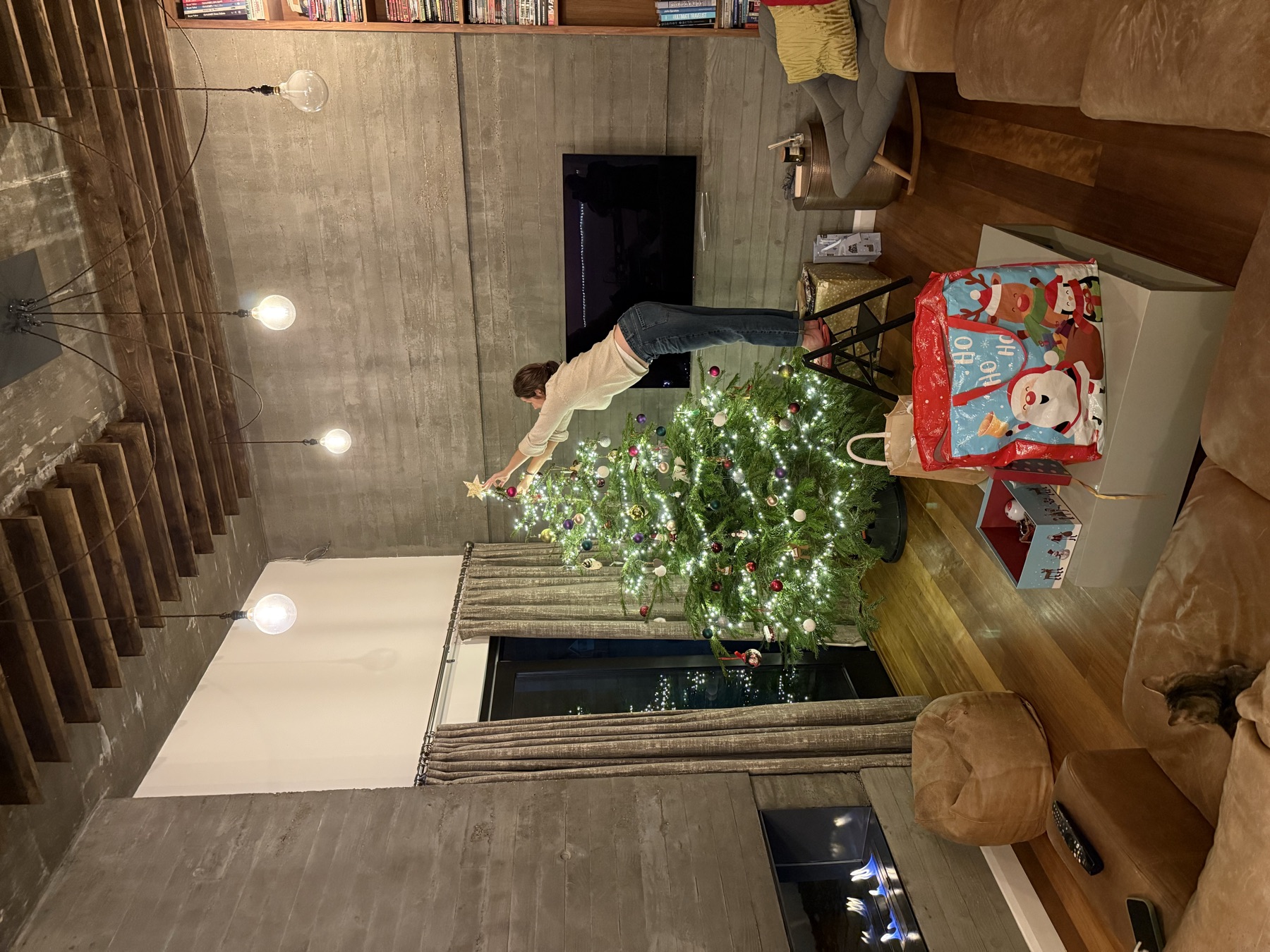 Kate putting the star on the Christmas tree