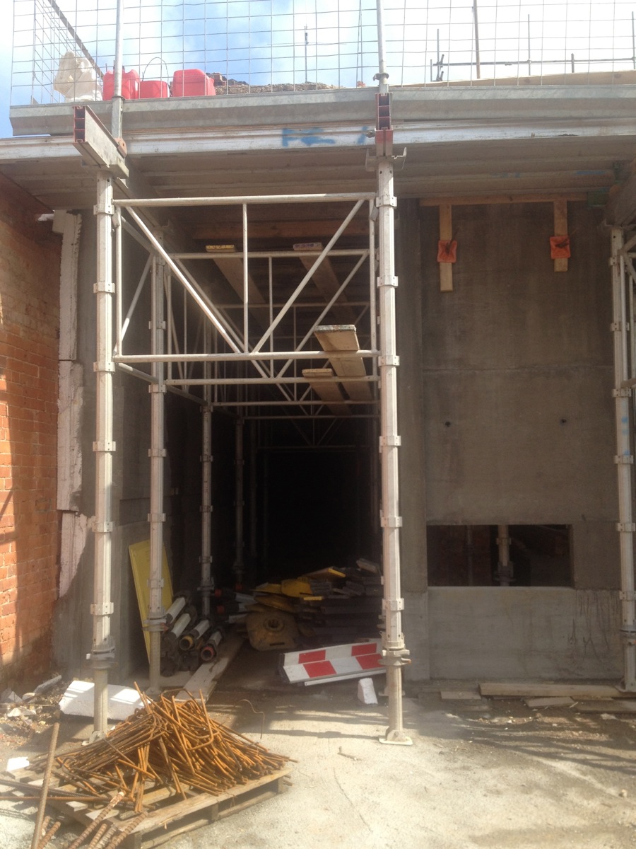 The board marked concrete wall and fireplace