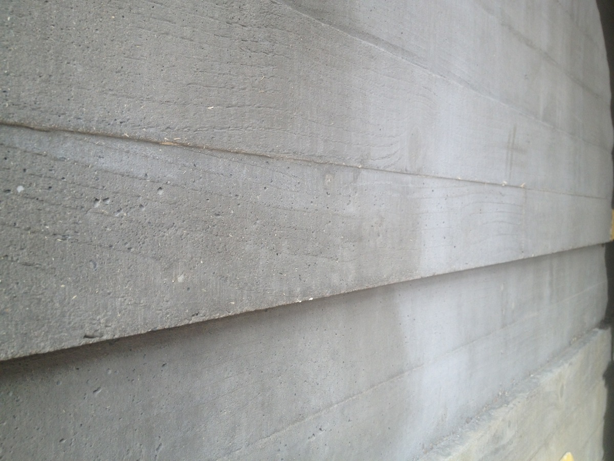 The board marked concrete wall and fireplace