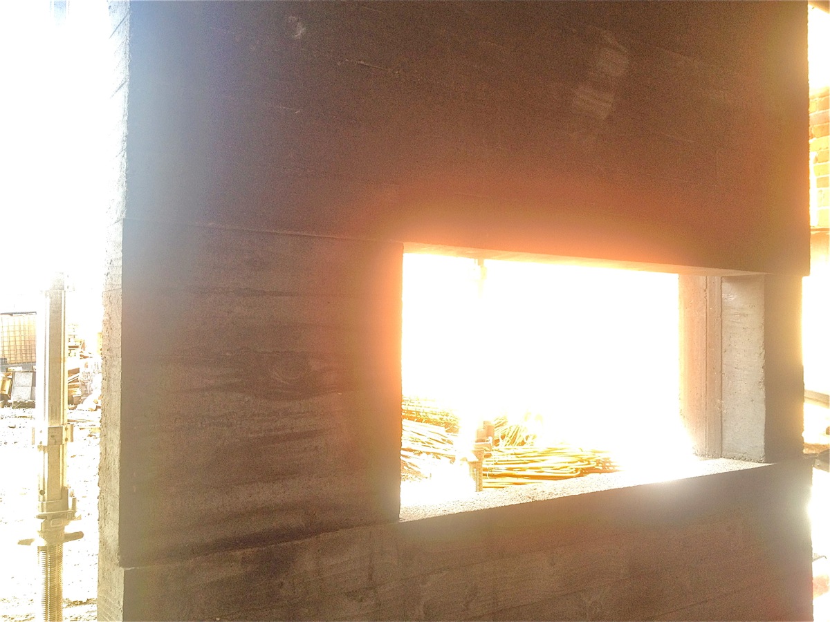 The board marked concrete wall and fireplace
